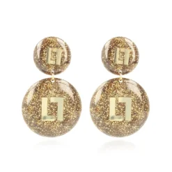 Gouden Glitter Oorbellen Larissa Logo